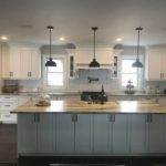 Bright white kitchen with an island